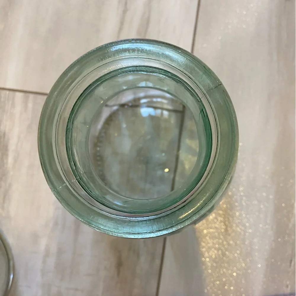 Bundle of Clear Round and Light Green Circular Textured Glass Vases